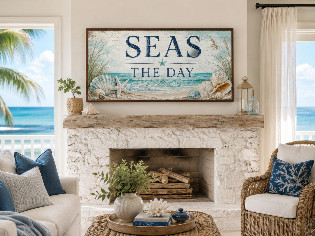 Seas the Day canvas wall art with starfish and seashells above a white stone fireplace.