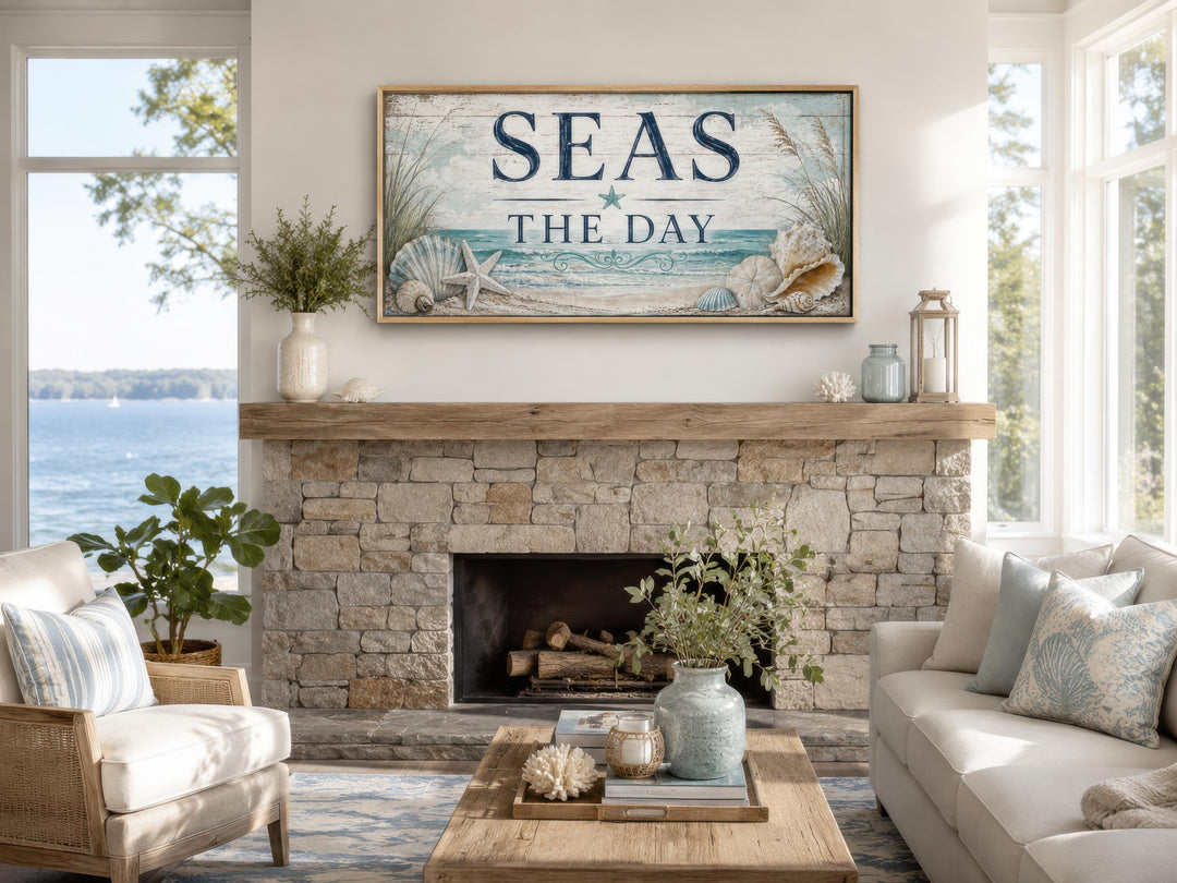 Coastal wall art canvas print with "Seas the Day" text, starfish, and seashells above a fireplace.