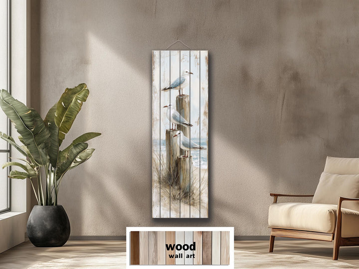 Coastal wood wall art featuring seagulls on posts with a distressed beach print on tall wood panels.