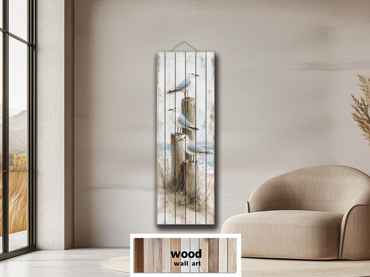 Coastal wood wall art featuring seagulls on posts with a distressed beach print.
