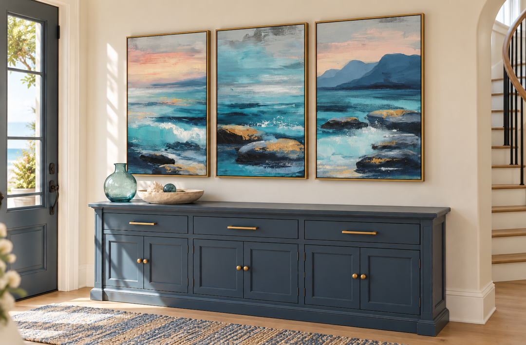 Coastal Ocean Set of 3 Canvas Wall Art featuring blue teal waves in gold frames above a blue console.