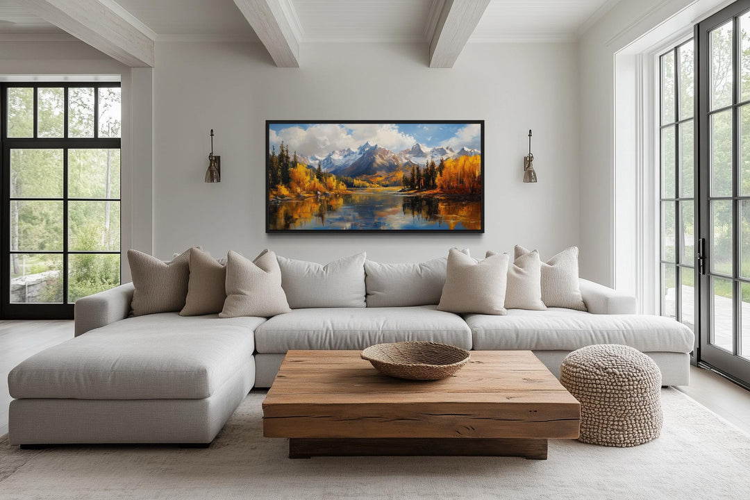 Colorado Rocky Mountains in Autumn framed canvas wall art above a modern sectional sofa.