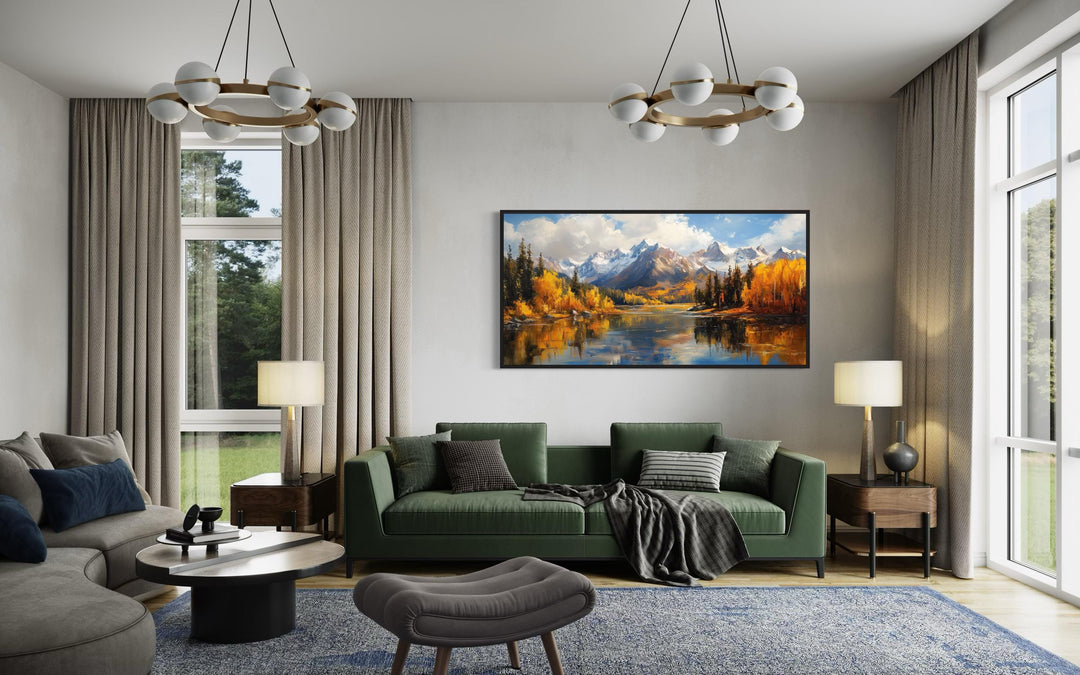 Colorado Rocky Mountains in Autumn framed canvas wall art above a green sofa in a living room.