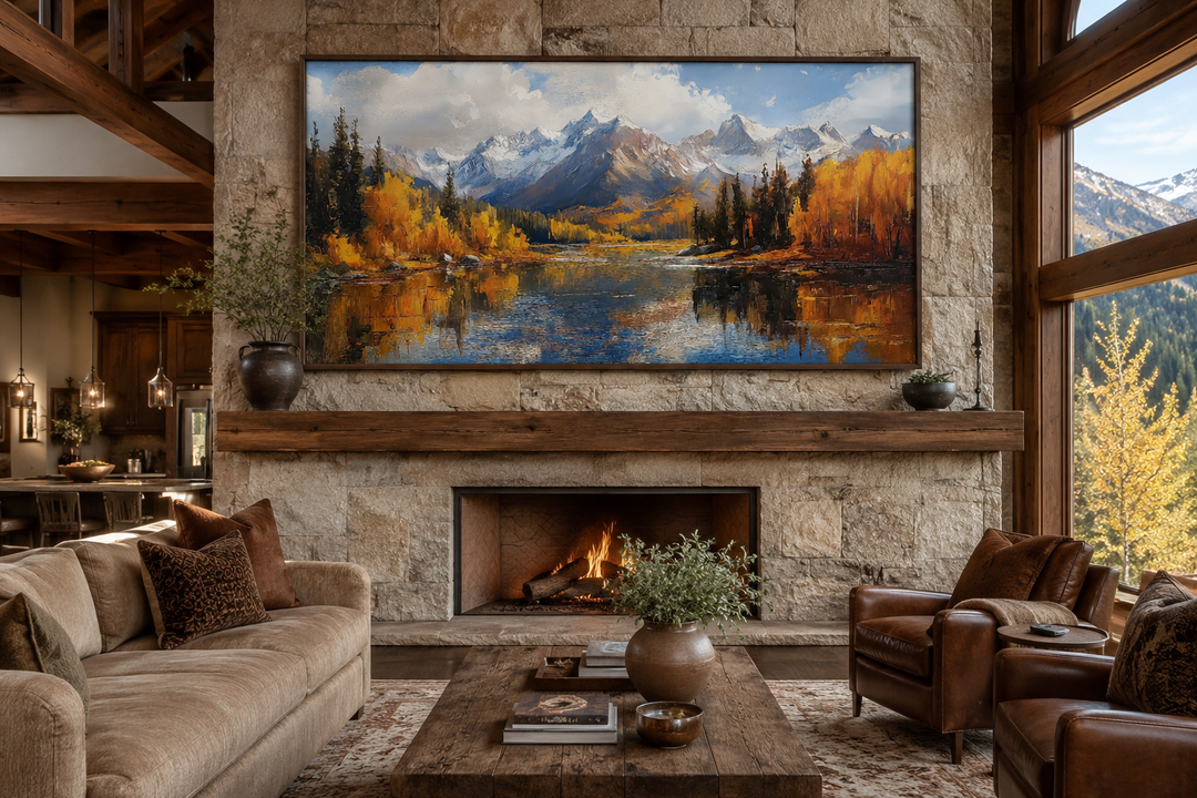 Framed canvas painting of Colorado Rocky Mountains in autumn above a stone fireplace.