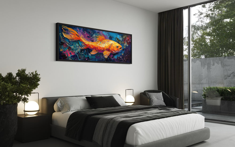 Colorful Abstract Goldfish Long Horizontal Framed Canvas Wall Art in a bedroom with a black bed