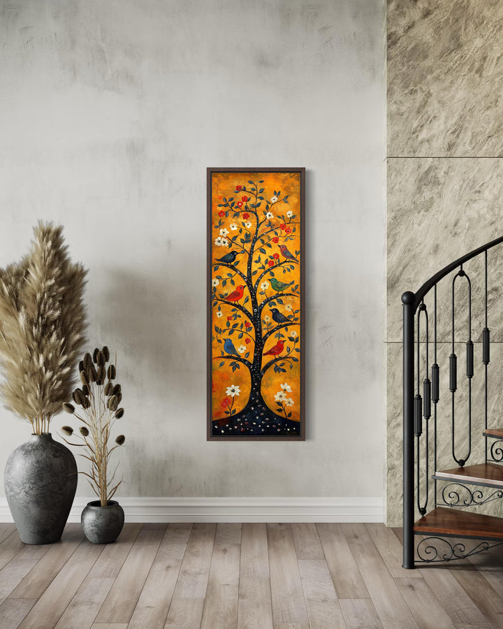 Tall narrow vertical folk art canvas print of a colorful bird-filled tree on an orange background.