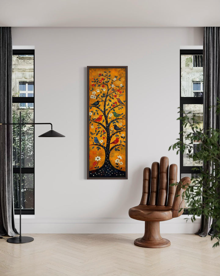 Tall narrow vertical canvas print of a folk art tree with colorful birds on an orange background.