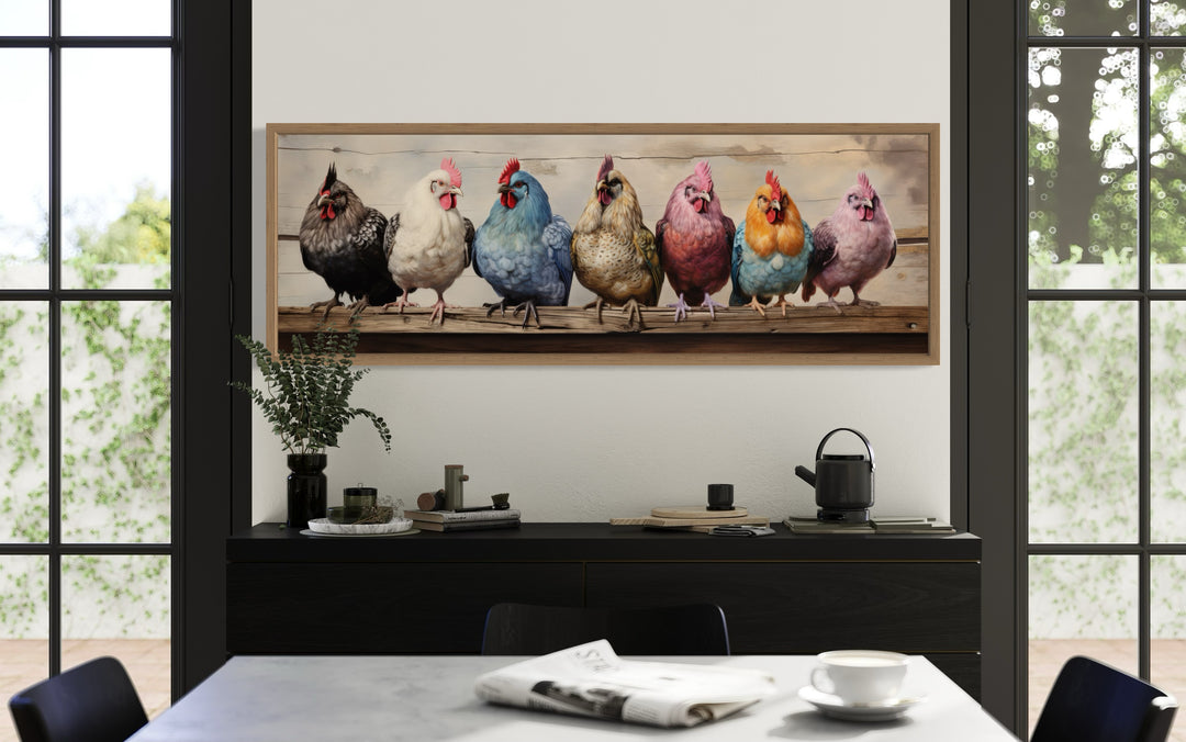 Panoramic framed canvas wall art of seven colorful chickens perched on a rustic wooden fence.