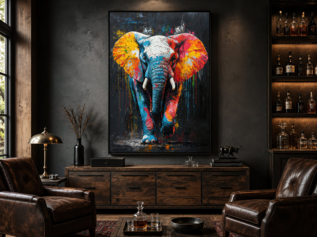 Colorful graffiti elephant framed canvas wall art hanging in a modern dark-toned living room.