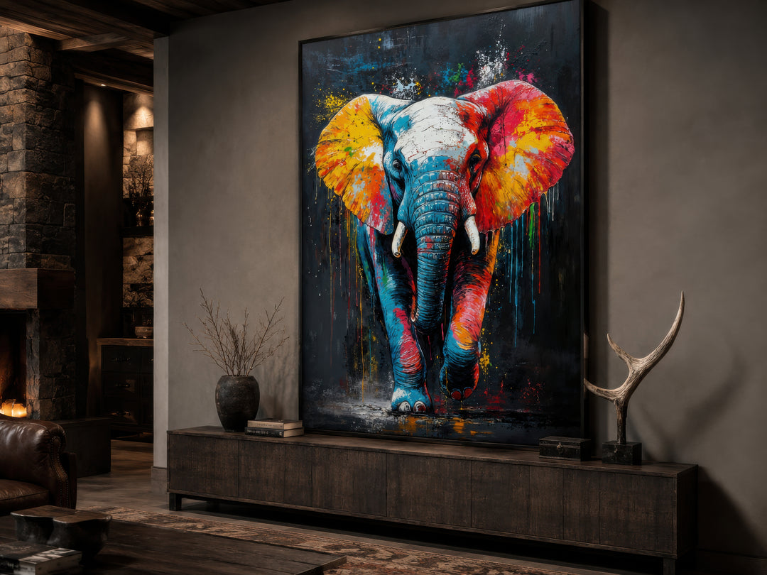 Colorful graffiti elephant framed canvas wall art displayed above a dark wood console table.