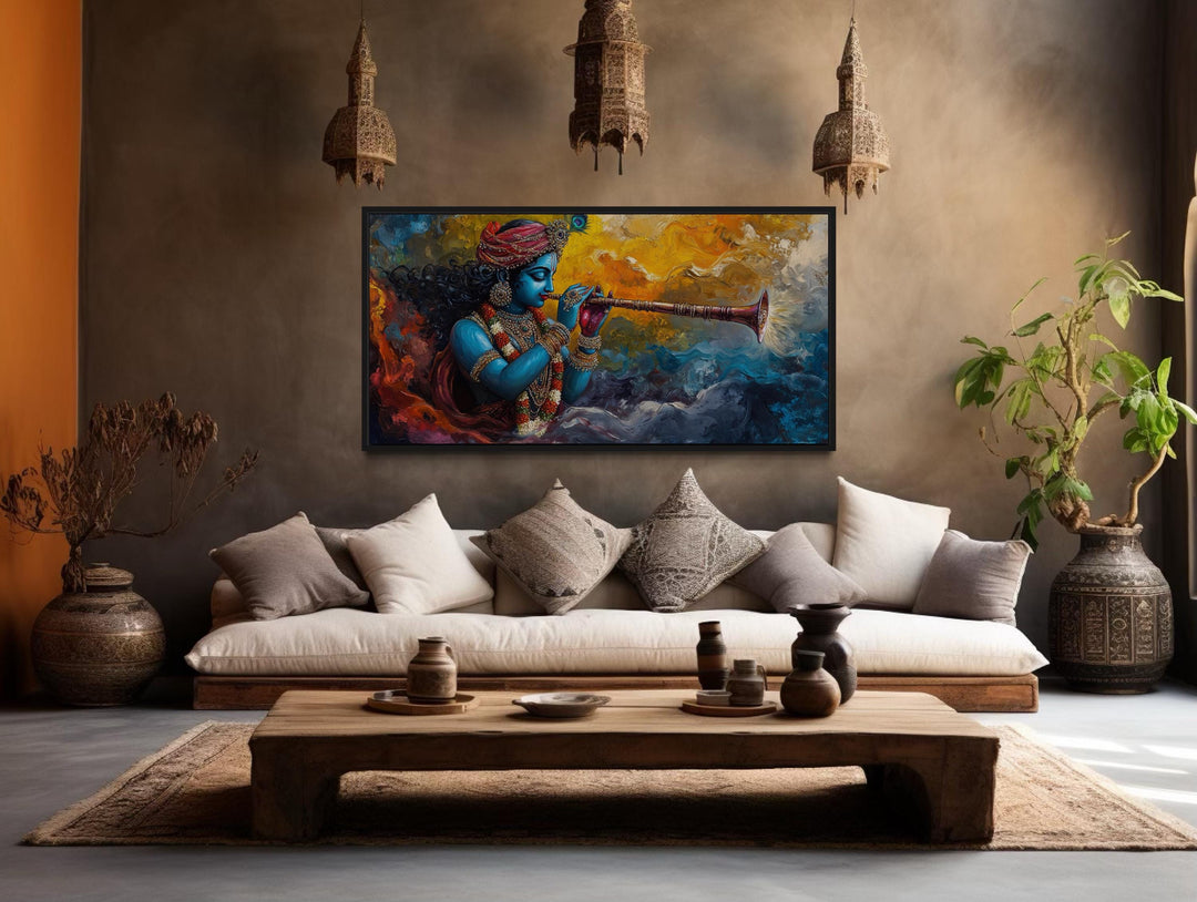 Colorful Krishna playing flute framed horizontal canvas wall art in a bohemian living room.