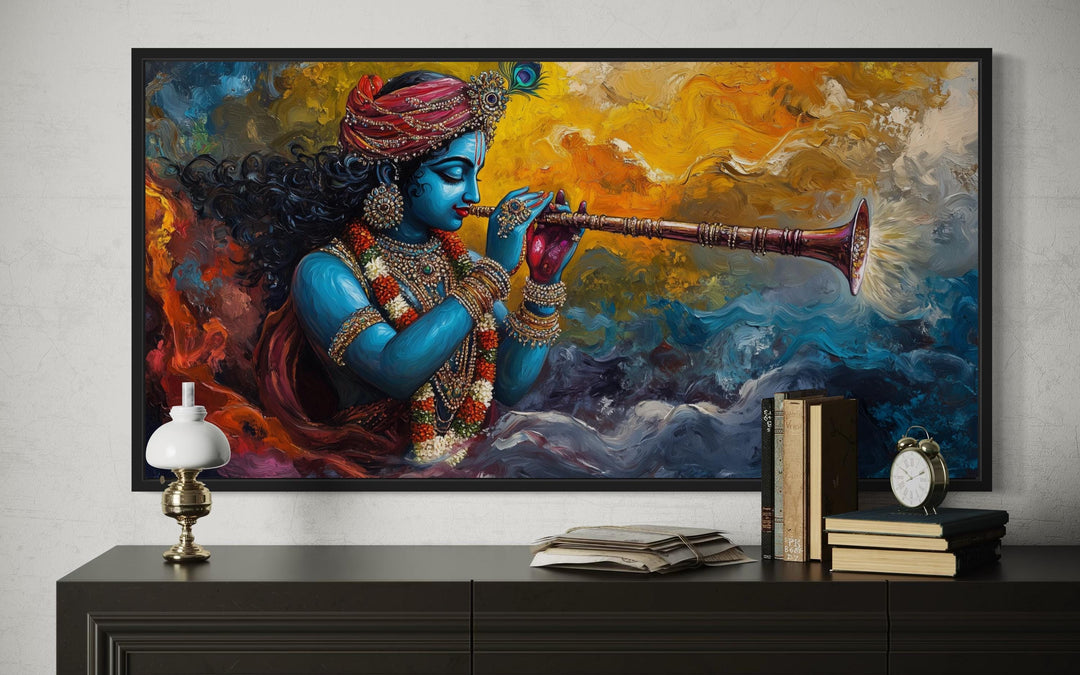 Colorful Krishna Playing Flute Framed Horizontal Canvas Wall Art above a dark wooden console table.
