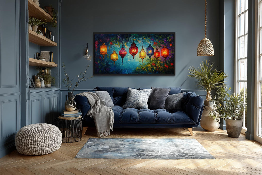 Colorful lanterns canvas wall art hanging above a blue sofa in a modern living room.