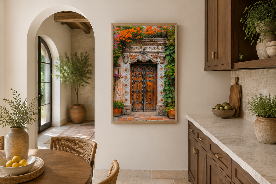Framed canvas wall art of a colorful Mexican door with orange flowers in a rustic kitchen setting.