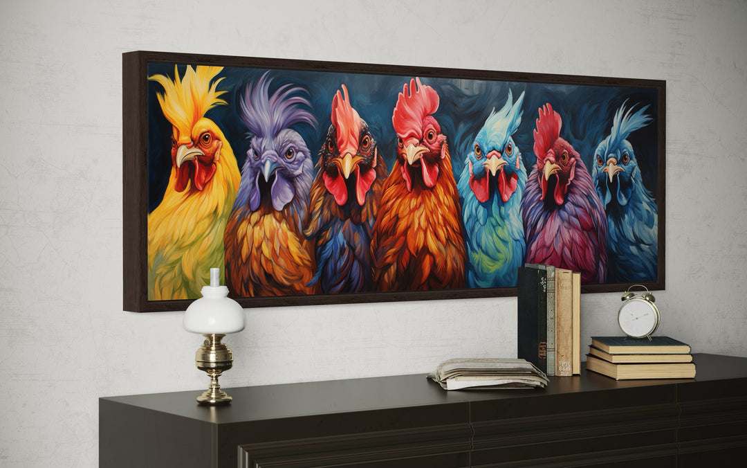 Colorful roosters and chickens horizontal farmhouse wall art in a dark frame above a sideboard.