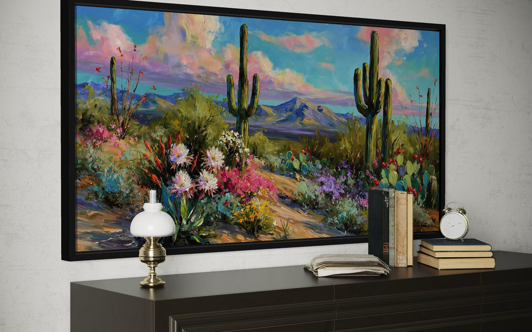 Colorful saguaro cactus and wildflower desert landscape canvas wall art in a black frame.