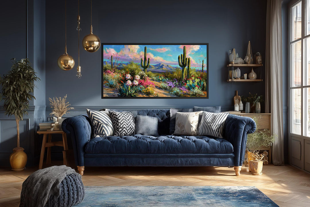 Colorful saguaro cactus and wildflower desert canvas wall art in a modern living room.