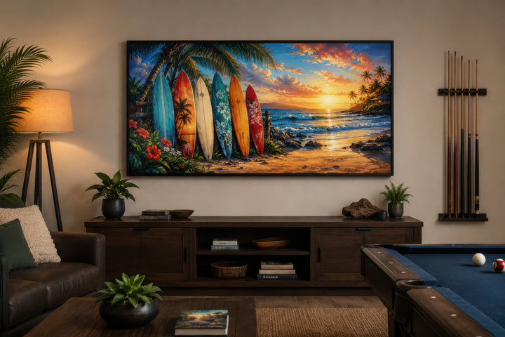 Colorful surfboards on a tropical beach at sunset framed canvas wall art in a modern living room.
