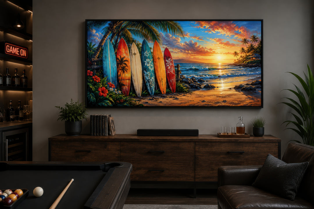 Colorful surfboards on a sunset beach framed canvas wall art in a modern living room setting.