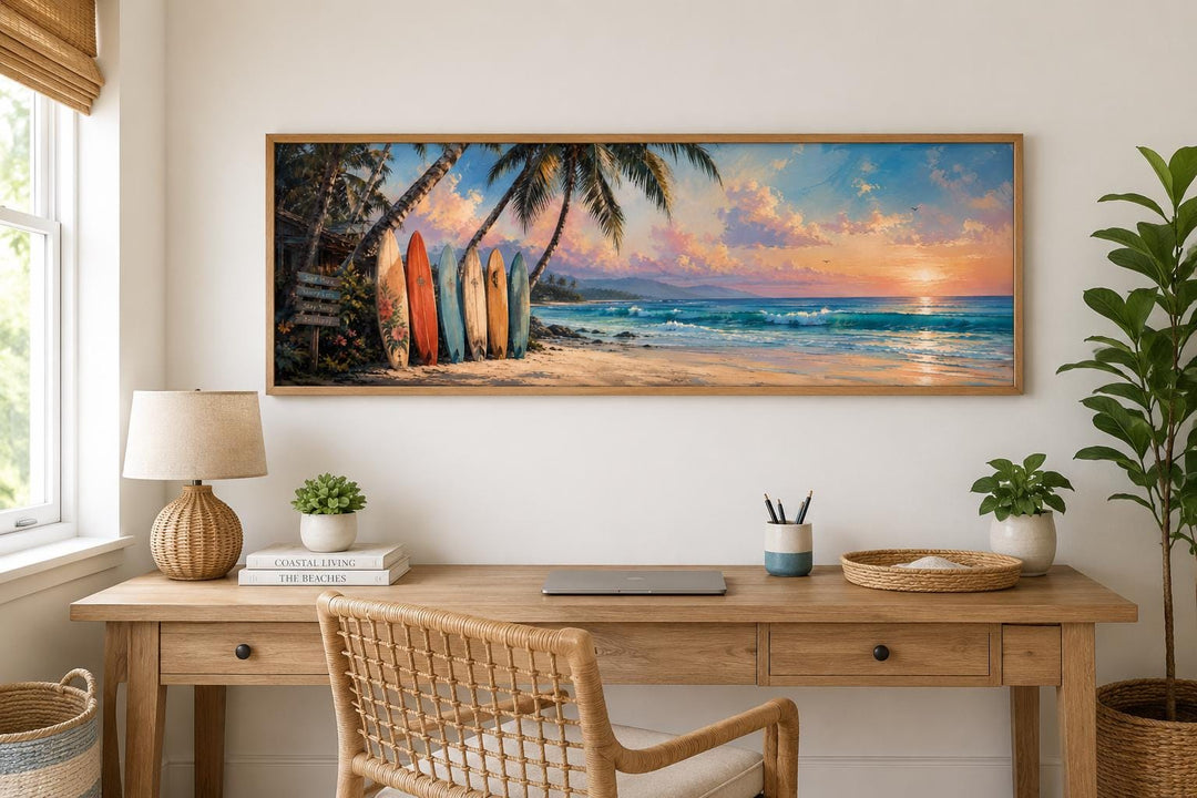 Colorful surfboards on a beach at sunset tropical horizontal canvas wall art above a wooden desk.