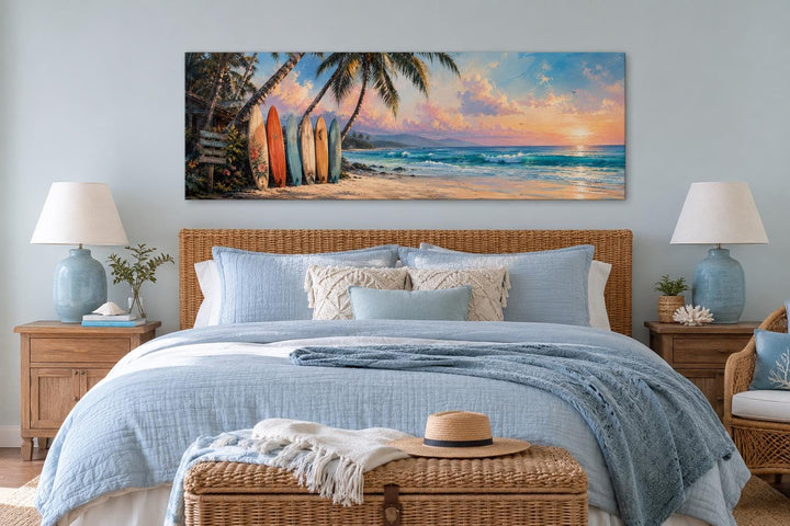 Colorful surfboards on a tropical beach at sunset horizontal canvas wall art above a bed.
