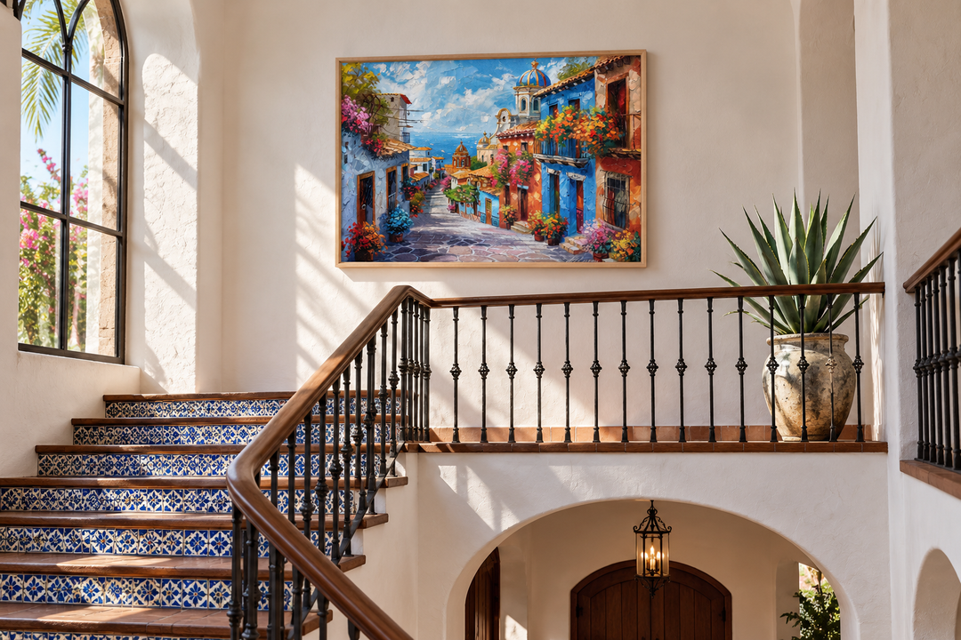 Colorful Mexican village street framed canvas wall art hanging in a bright, Mediterranean hallway.