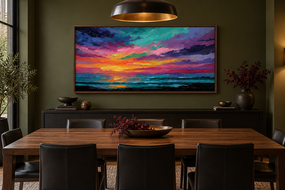 Colorful abstract ocean sunset framed canvas wall art above a dining table in a modern room.