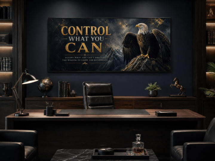 Motivational bald eagle canvas art with gold text in a dark, sophisticated office setting.