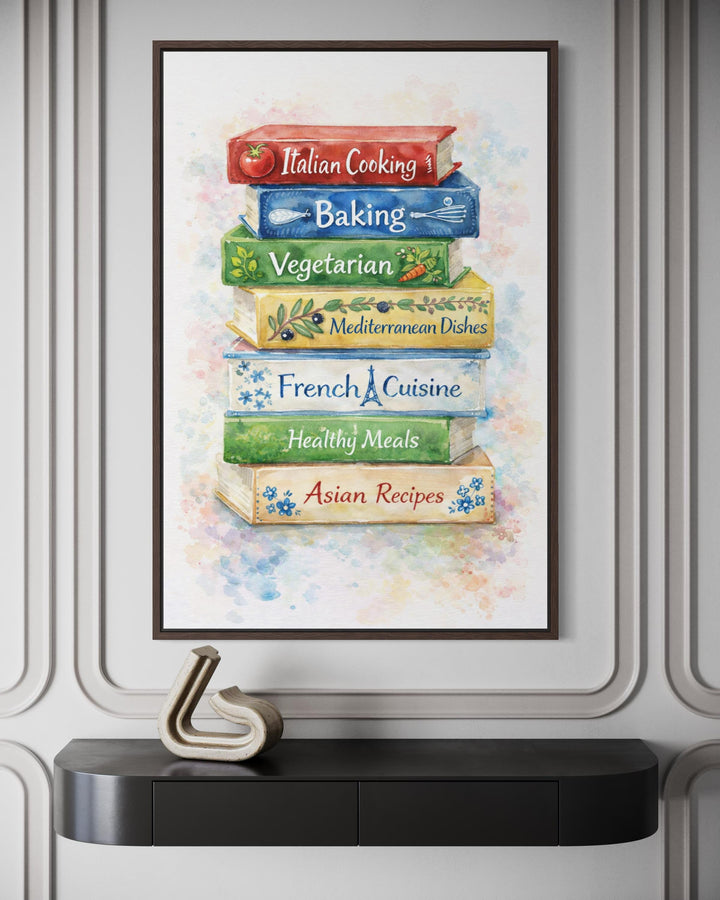 A framed watercolor canvas print of stacked colorful cookbooks hangs above a modern black console.