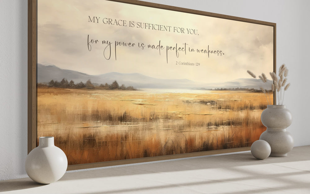 Corinthians 12:9 scripture wall art on a vintage farm landscape with warm, earthy tones.