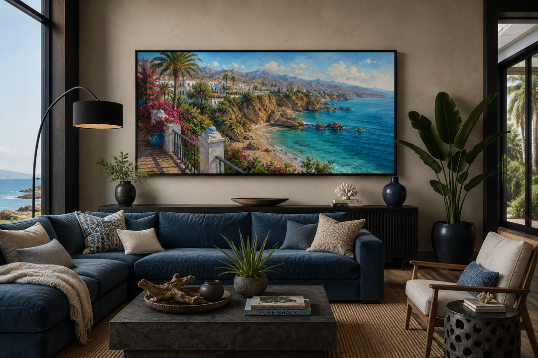 Costa Del Sol Mediterranean coastal village framed canvas wall art above a blue sectional sofa.