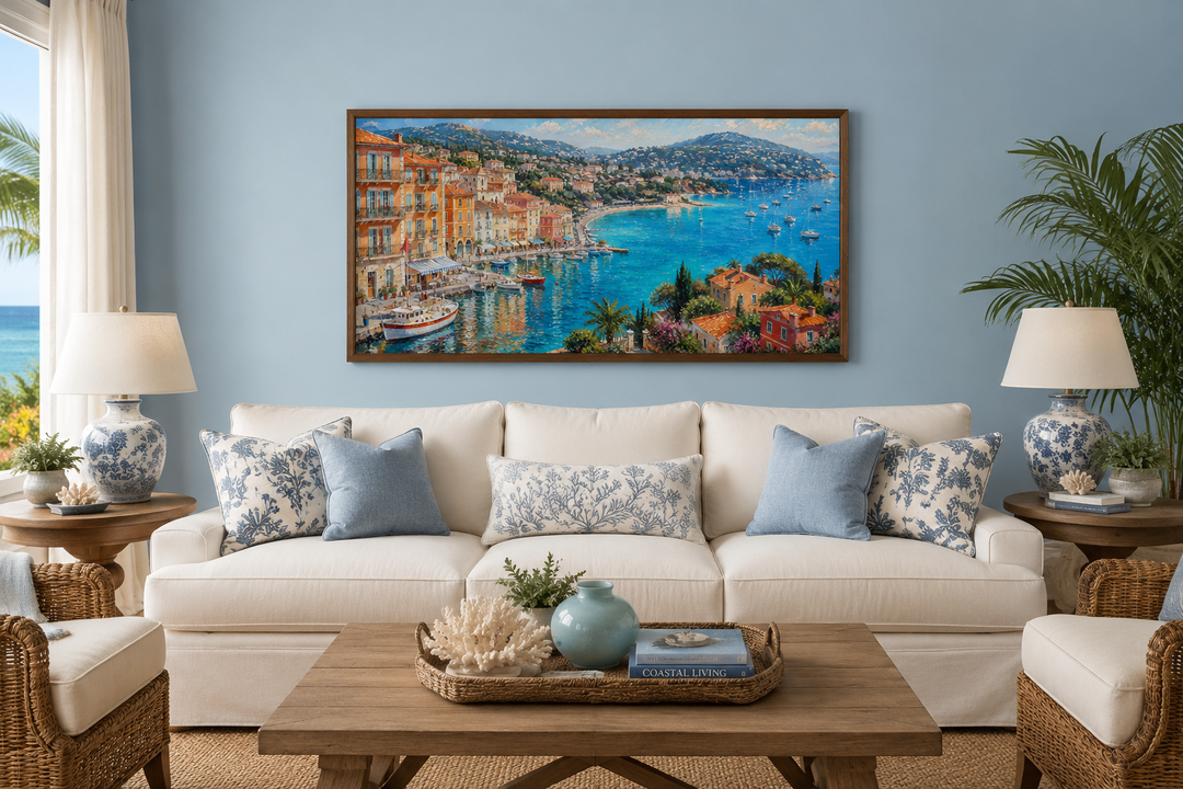 Cote d'Azur French Riviera coastal village harbor painting above a white sofa in a blue living room.