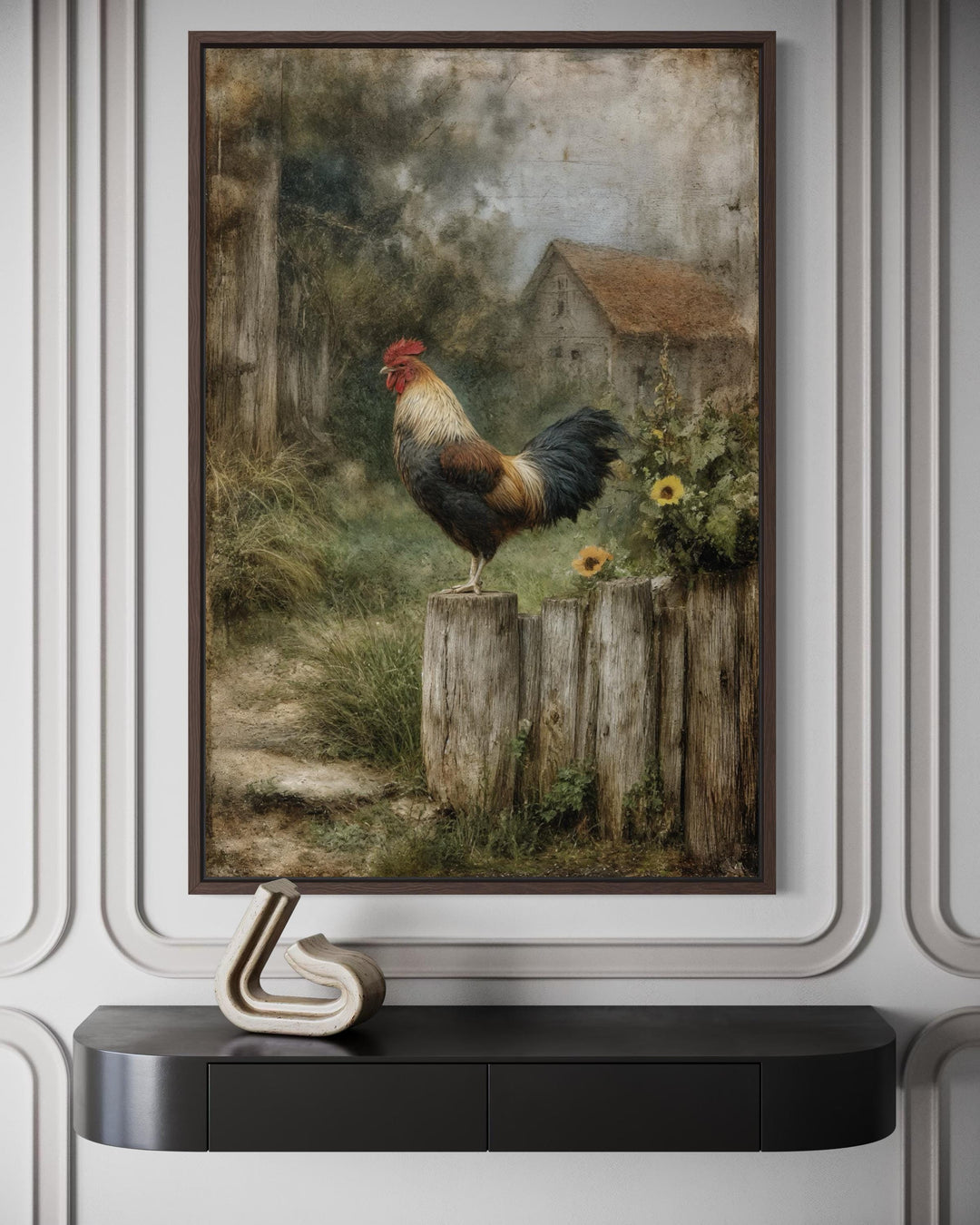 A framed canvas print of a rooster on a wooden fence with a rustic barn landscape in the background.