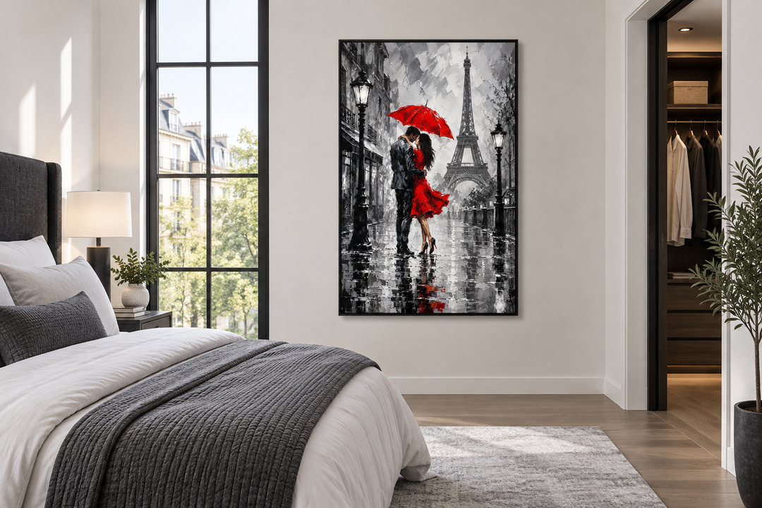 Romantic canvas wall art of a couple kissing under a red umbrella in Paris, hung in a modern bedroom.