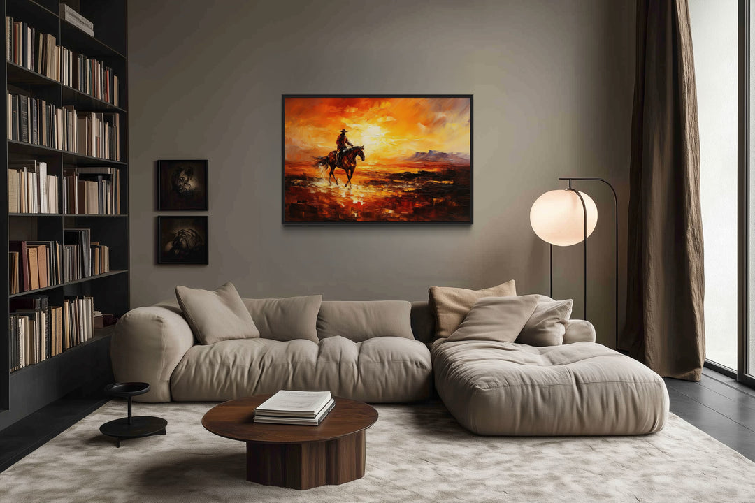 Cowboy riding a horse in the desert at sunset wild west canvas art in a modern living room.