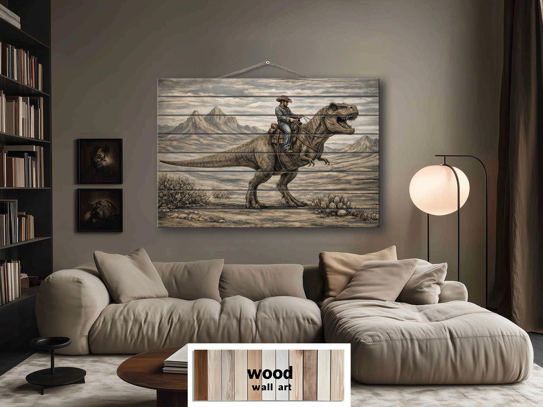 Rustic wood wall art featuring a cowboy riding a dinosaur in a sepia-toned western landscape.