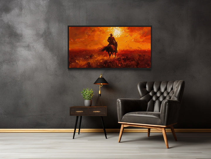 Cowboy Riding Into Sunset Western Canvas Wall Art in the office