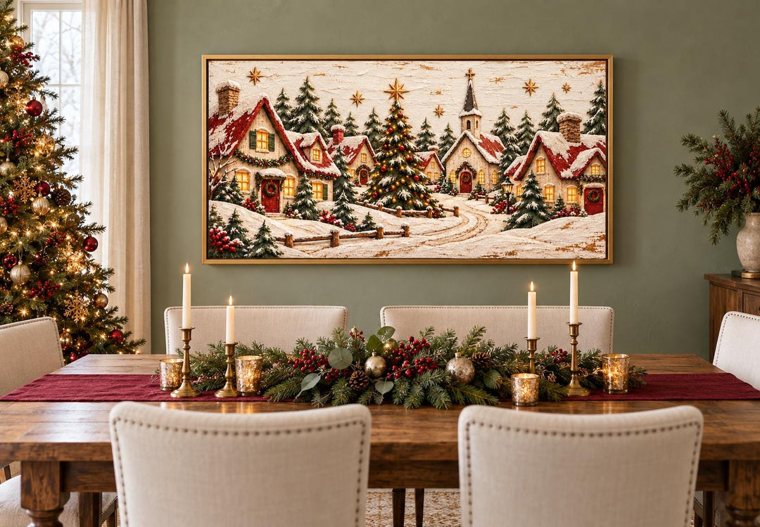 Cozy Christmas Village framed canvas wall art above a dining table with festive holiday decor.