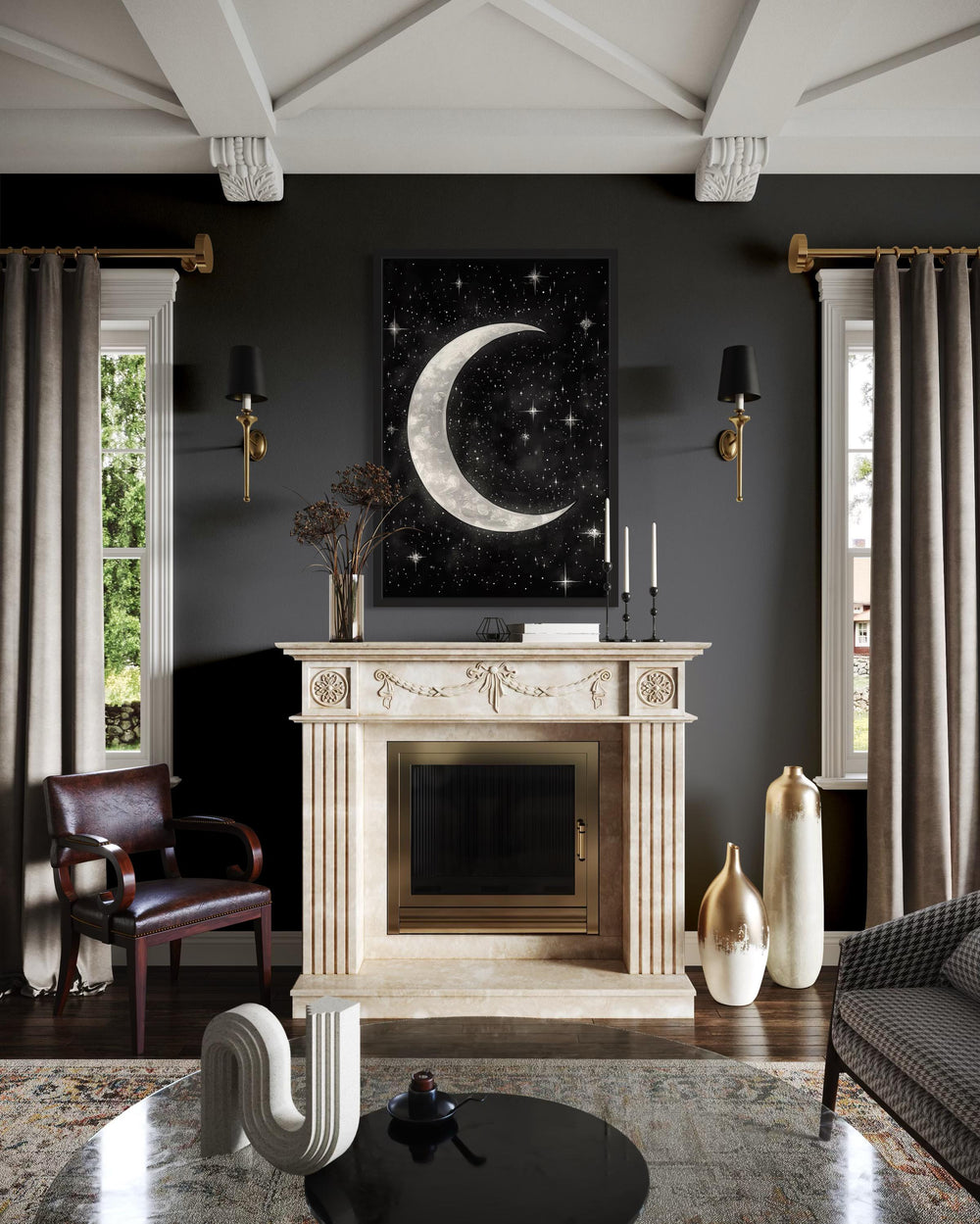 Crescent moon and stars framed canvas wall art hanging above a fireplace in a dark, moody room.