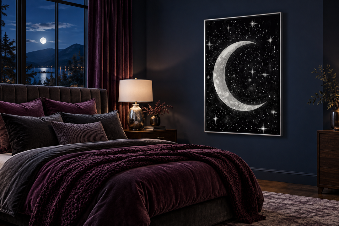 Crescent moon and stars framed canvas wall art in a dark bedroom with purple bedding.
