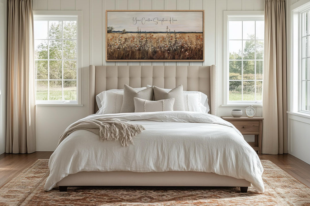 Custom scripture wall art featuring a wildflower landscape above a bed in a neutral bedroom.