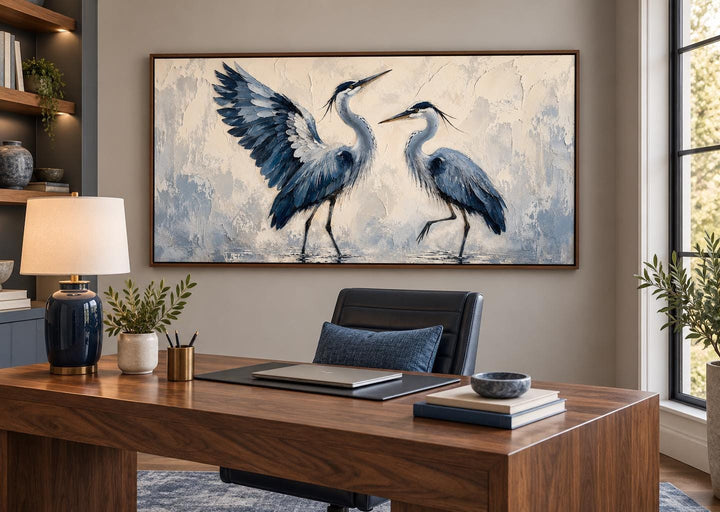 Dancing Blue Herons navy and cream canvas wall art displayed in a modern home office.