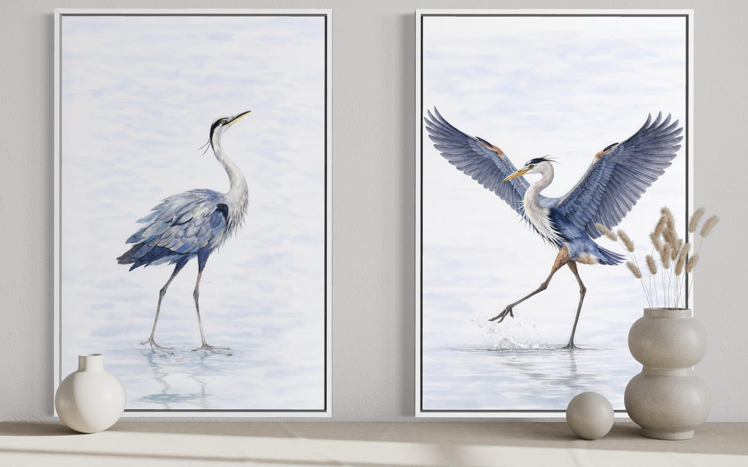 Set of two watercolor canvas prints featuring elegant herons in graceful, dancing poses.