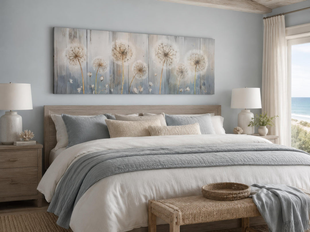 Long horizontal dandelion canvas wall art in a farmhouse bedroom with blue and cream bedding.