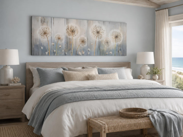 Long horizontal dandelion canvas wall art in a farmhouse bedroom with blue and cream bedding.