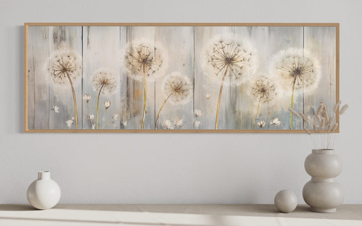 Horizontal canvas wall art featuring dandelions painted on a distressed wood background.