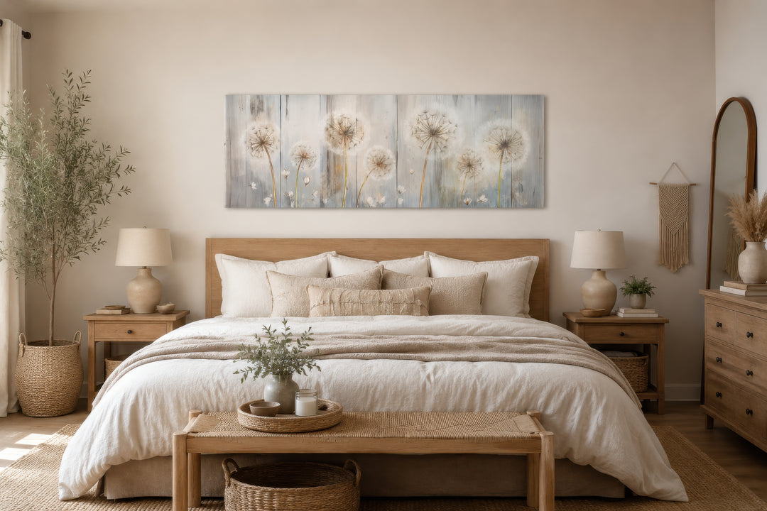 Panoramic canvas wall art featuring dandelions on a distressed wood background above a bed.