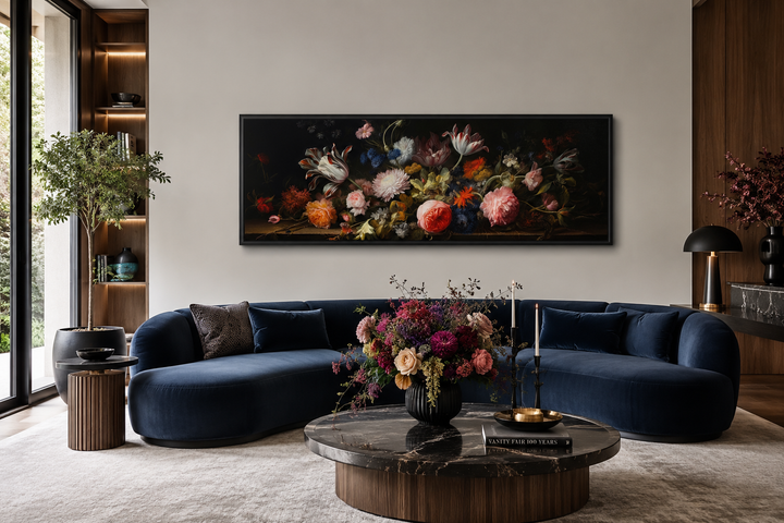 Dark Academia antique flowers moody horizontal framed canvas wall art above a blue velvet sofa.