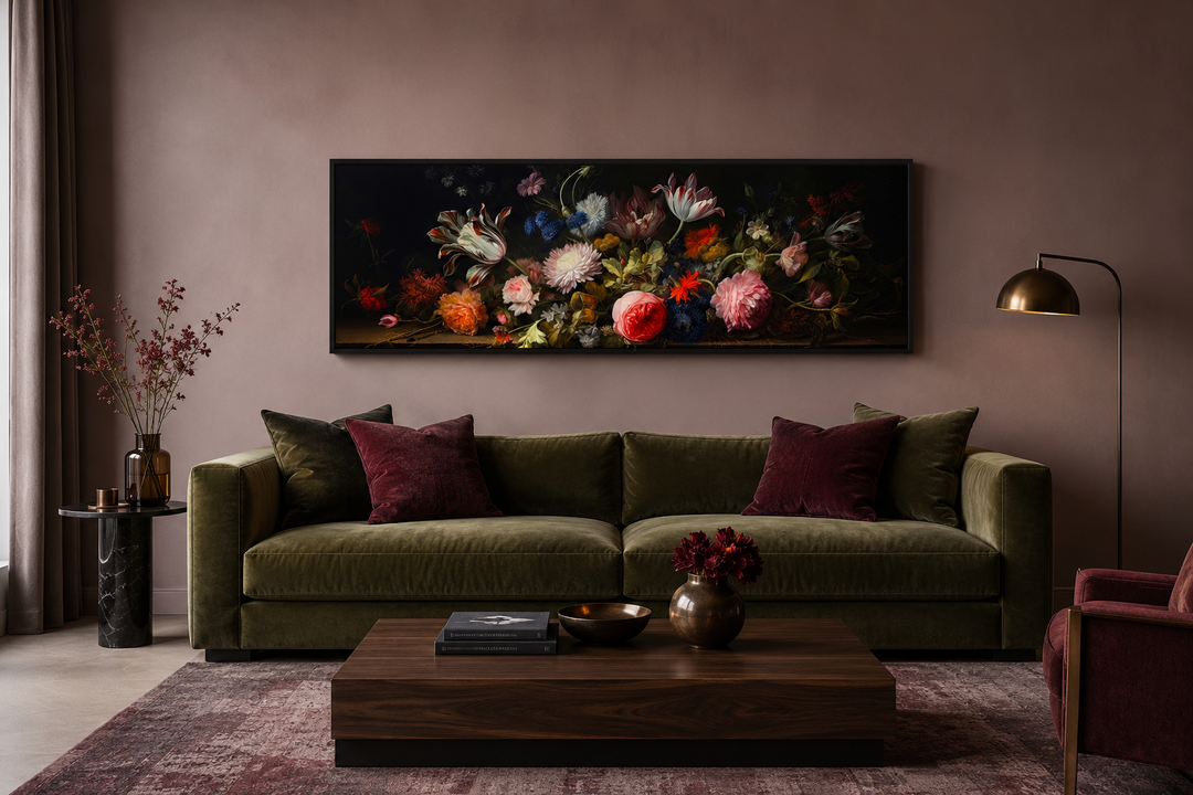 Dark Academia antique flowers moody horizontal framed canvas wall art above a green velvet sofa.