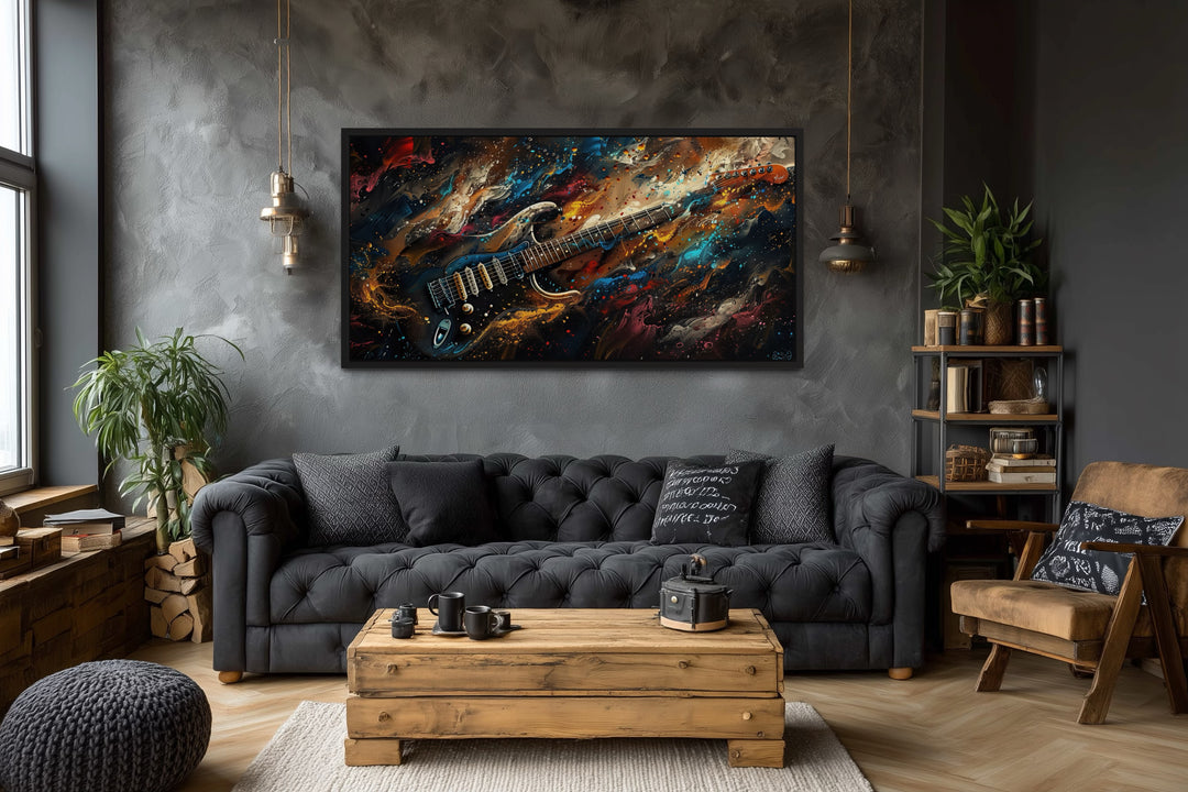Dark colorful electric guitar framed canvas wall art in a modern music-themed living room.